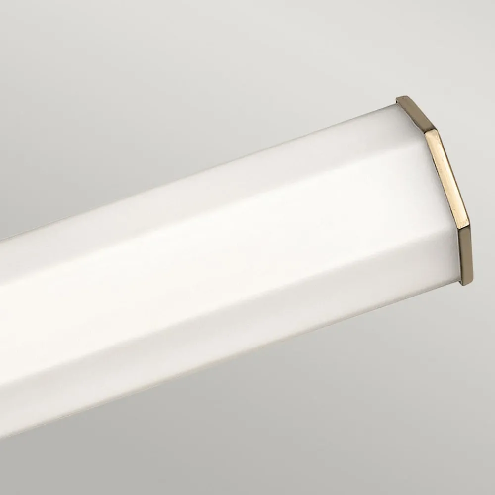 Quintiesse Væg- Og Spejllamper > LED-væglampe til badeværelset Facet Dual, messing, 2 lyskilder, bredde 66 cm