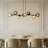 Lindby Pendellamper|Pendellamper > pendellampe Isamer, smoke grey/amber, 130 cm, globe