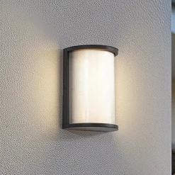 Terrassebelysning ^ Lindby udendørs LED-væglampe Calvik, sort, riflet, IP44