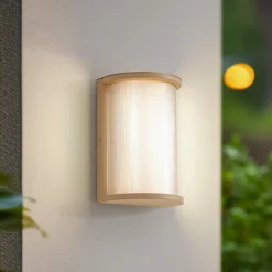 Terrassebelysning ^ Lindby udendørs LED-væglampe Calvik, beige, riflet, IP44