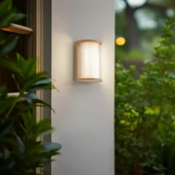 Terrassebelysning ^ Lindby udendørs LED-væglampe Calvik, beige, riflet, IP44