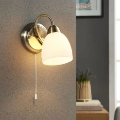 Gang|Pendellamper ^ Lindby væglampe Mael, højde 20 cm, antik messing, trækkontakt