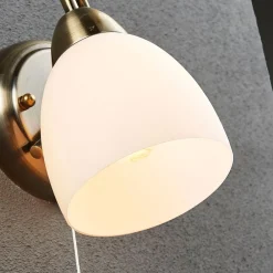 Gang|Pendellamper ^ Lindby væglampe Mael, højde 20 cm, antik messing, trækkontakt