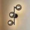 Lindby Pendellamper|Væglamper > væglampe Orbelia, sort, 3 lyskilder, glas, G9
