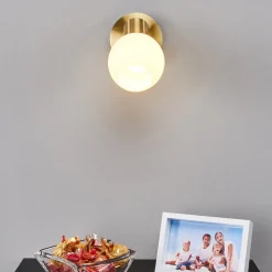 Lindby Gang|Pendellamper > vægspot Elaina, messingfarvet, glas, 14 cm høj, E14