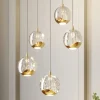 Lucande Pendellamper|Pendellamper > LED-pendellampe Hayley, Ø 30 cm, 5 lyskilder, guld, glas