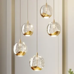 Lucande Pendellamper|Pendellamper > LED-pendellampe Hayley, Ø 30 cm, 5 lyskilder, guld, glas