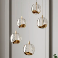 Lucande Pendellamper|Pendellamper > LED-pendellampe Hayley, Ø 30 cm, 5 lyskilder, guld, glas