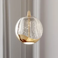 Lucande Pendellamper > LED-pendellampe Hayley, Ø 9 cm, guldfarvet, glas
