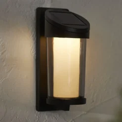 Solcellelamper ^ STAR TRADING Udendørs LED-væglampe Alippa, sort Højde 21 cm metal