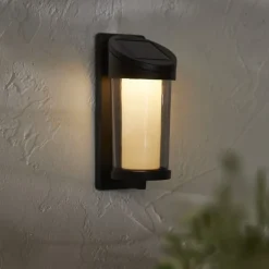 Solcellelamper ^ STAR TRADING Udendørs LED-væglampe Alippa, sort Højde 21 cm metal