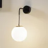 Væglamper ^ EMIBIG LIGHTING Væglampe Ognis K1 med kugleformet skærm, sort/guld